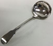 A heavy fiddle pattern silver sauce ladle with ini