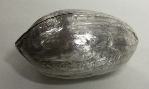 A heavy silver model of a walnut. Approx. 17 grams