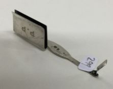 An unusual silver bookmark with spring mechanism.