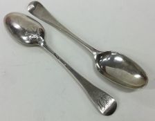 A pair of Georgian OE and shell pattern silver tea