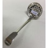 A George III silver fiddle pattern sifter spoon. L