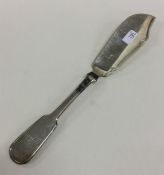 EXETER: A fiddle pattern silver butter knife of ty