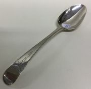 An early bright cut Georgian silver tablespoon. Lo