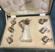 A cased French silver and glass mounted lemonade s