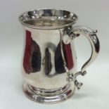 A large Georgian silver mug on spreading base. Lon