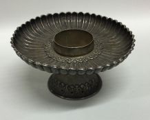 An 18th Century Tibetan silver dish of fluted desi