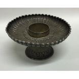 An 18th Century Tibetan silver dish of fluted desi