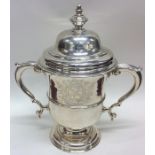 A large George II silver trophy cup and cover with