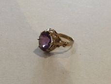 A 9 carat single stone ring in claw mount. Approx.