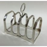 An Edwardian five bar silver toast rack. Birmingha