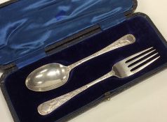 An attractive cased two piece silver christening s