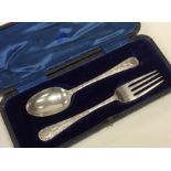 An attractive cased two piece silver christening s