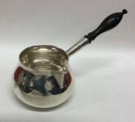 A good George III silver brandy pan with turned ha