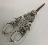 A heavy pair of cast silver grape scissors of Cont