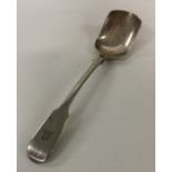 A large Colonial fiddle pattern silver sugar spoon