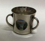 A miniature three handled silver tig decorated wit