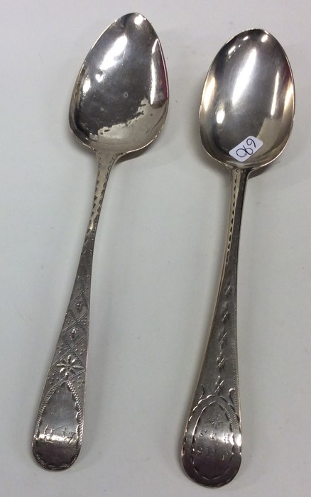 Two bright cut silver tablespoons. Various dates a