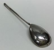 An unusual large Russian silver spoon of tapering