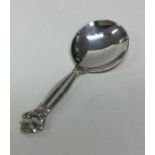 GEORG JENSEN: A silver caddy spoon of typical form