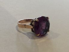 A 14 carat single stone ring in claw mount. Approx