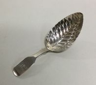 A Georgian silver half fluted caddy spoon with lea