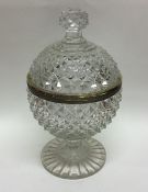 An attractive cut glass and silver gilt sweet dish