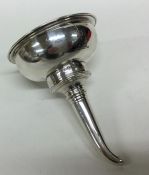 A good Georgian crested silver wine funnel of typi