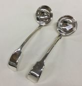 A pair of silver fiddle pattern sauce ladles. Lond