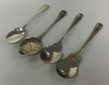 A group of four silver jam spoons. Various dates a