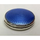 A silver and blue enamelled circular compact. Birm