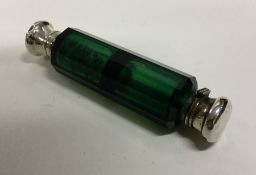 An unusual silver combination green glass double e