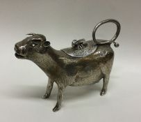 An unusual silver cow creamer of typical form with