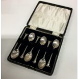 A heavy set of good quality silver coffee spoons o