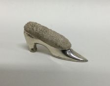 A rare silver pin cushion in the form of a high he