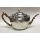 A good Georgian boat shaped silver teapot with eng