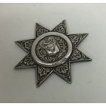 A Victorian silver badge (Order of The Foresters).