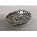 A heavy Continental Antique silver dish decorated