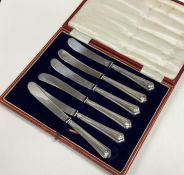 A cased set of six silver handled tea knives. Appr