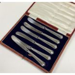 A cased set of six silver handled tea knives. Appr