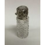 A silver mounted hinged top hobnail cut scent bott