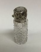 A silver mounted hinged top hobnail cut scent bott