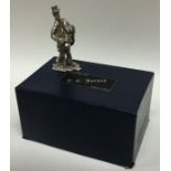 A cast silver figure of man in presentation case w