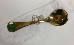 GEORG JENSEN: A silver gilt spoon with clover leaf