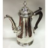 A massive George II silver tapering coffee pot on