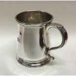A heavy George II silver mug on spreading base. Lo