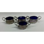 A set of four Edwardian silver salts with BGLs. Bi