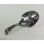 A good Georgian silver caddy spoon with pierced bo