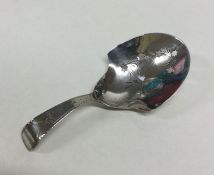 A good Georgian silver caddy spoon with pierced bo