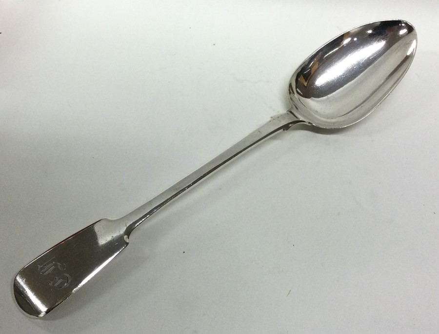 A silver fiddle pattern basting spoon. London 1848