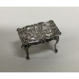 A miniature chased silver table. Birmingham. By L&